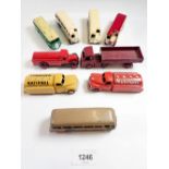 A collection of nine vintage Dinky buses and lorries
