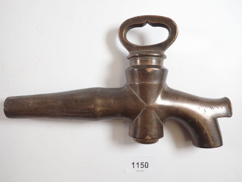 A 19th century brass barrel tap, stamped G Deem, Martineau & Smith, 25cm long