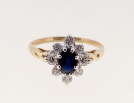 A 9 carat gold sapphire and white stone cluster ring, size M to N, 1.8g