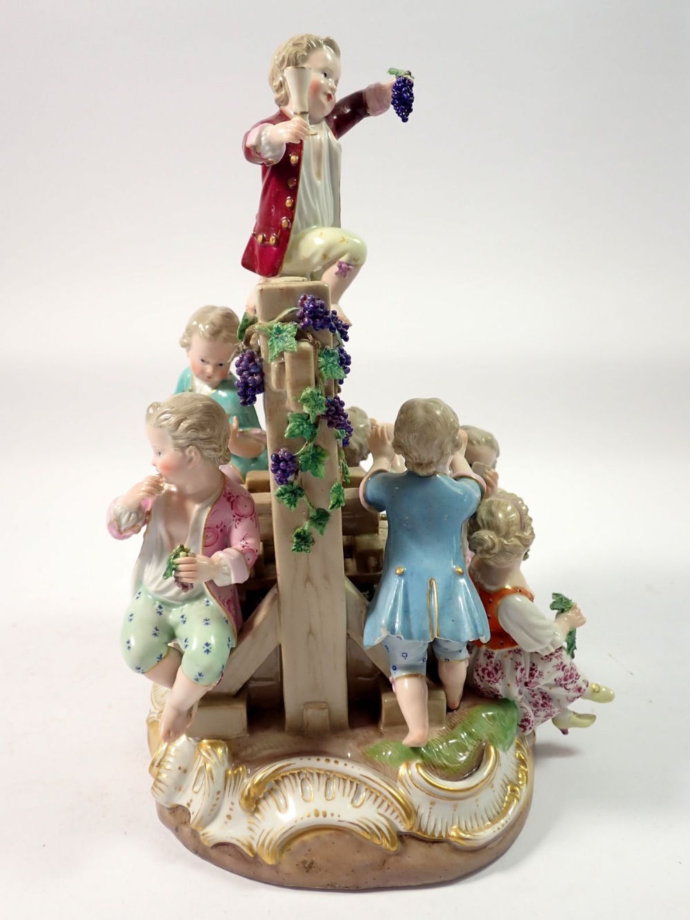 A 19th century Meissen group of children playing around a wine press, crossed swords mark to base, - Image 5 of 7