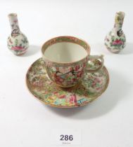 A Chinese Canton cup and saucer and a pair of miniature vases