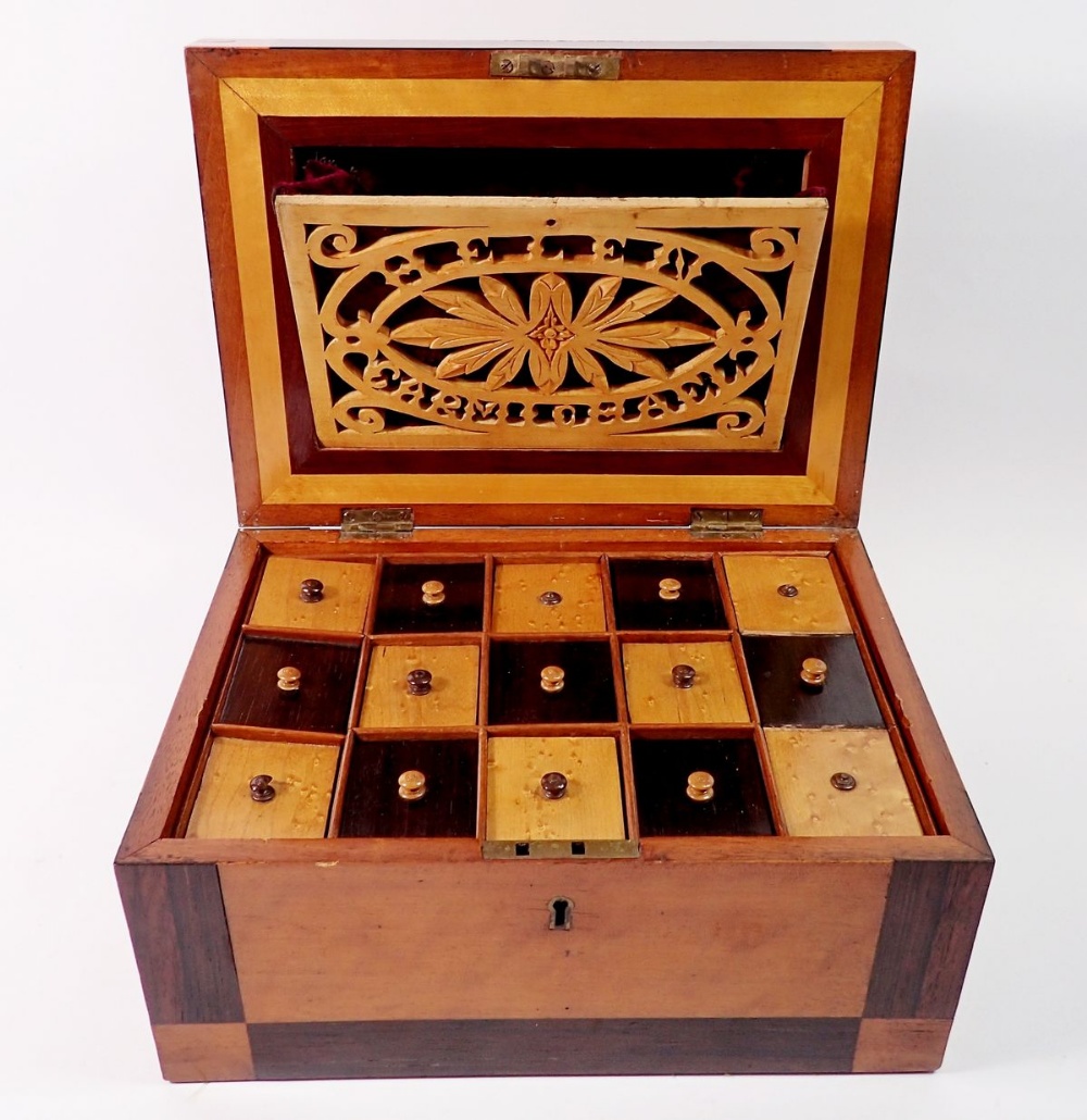 A 19th century satinwood and rosewood jewellery box, the inner lid with carved floral panel and name