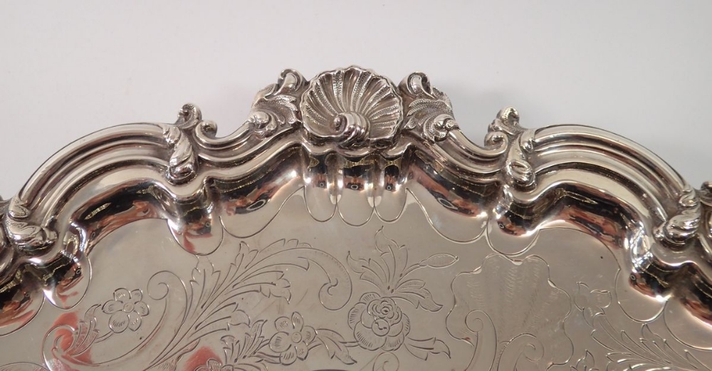 A Victorian silver pie crust edge large salver with engraved flower and scrollwork decoraton, on - Image 4 of 6