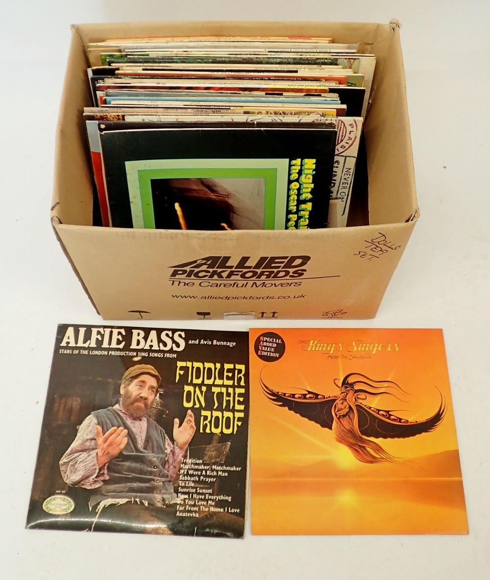 A box of various 1970's records including children's, folk, world music etc