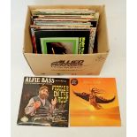 A box of various 1970's records including children's, folk, world music etc