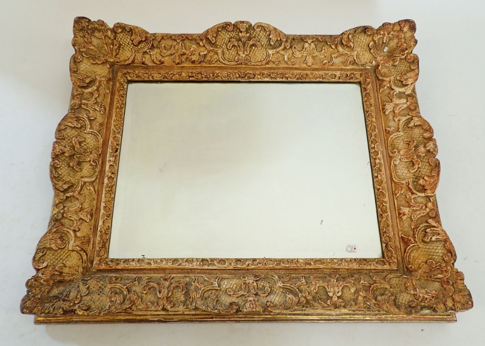 A 19th century heavy carved oak and gesso framed mirror with shell and foliage decoration, 48 x 56cm