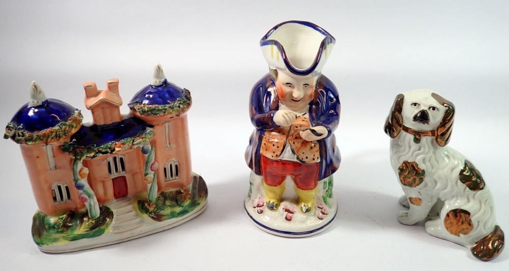 A Victorian Stafordshire turreted cottage, an Allerton's Toby jug and a copper lustre