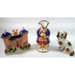 A Victorian Stafordshire turreted cottage, an Allerton's Toby jug and a copper lustre