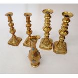 Four Georgian brass candlesticks, tallest 25cm and an Indian vase inlaid turquoise
