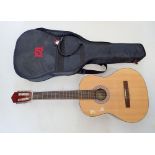 A Jose Ferrer Estudiante 4/4 classical guitar in soft padded case