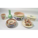 A Poole group of china including butter dish, egg cups, posy ring etc.