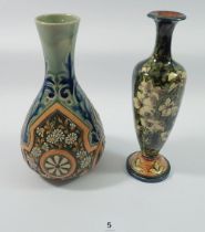 A Doulton Lambeth stoneware vase decorated flowers and blue scrollwork decoration and another