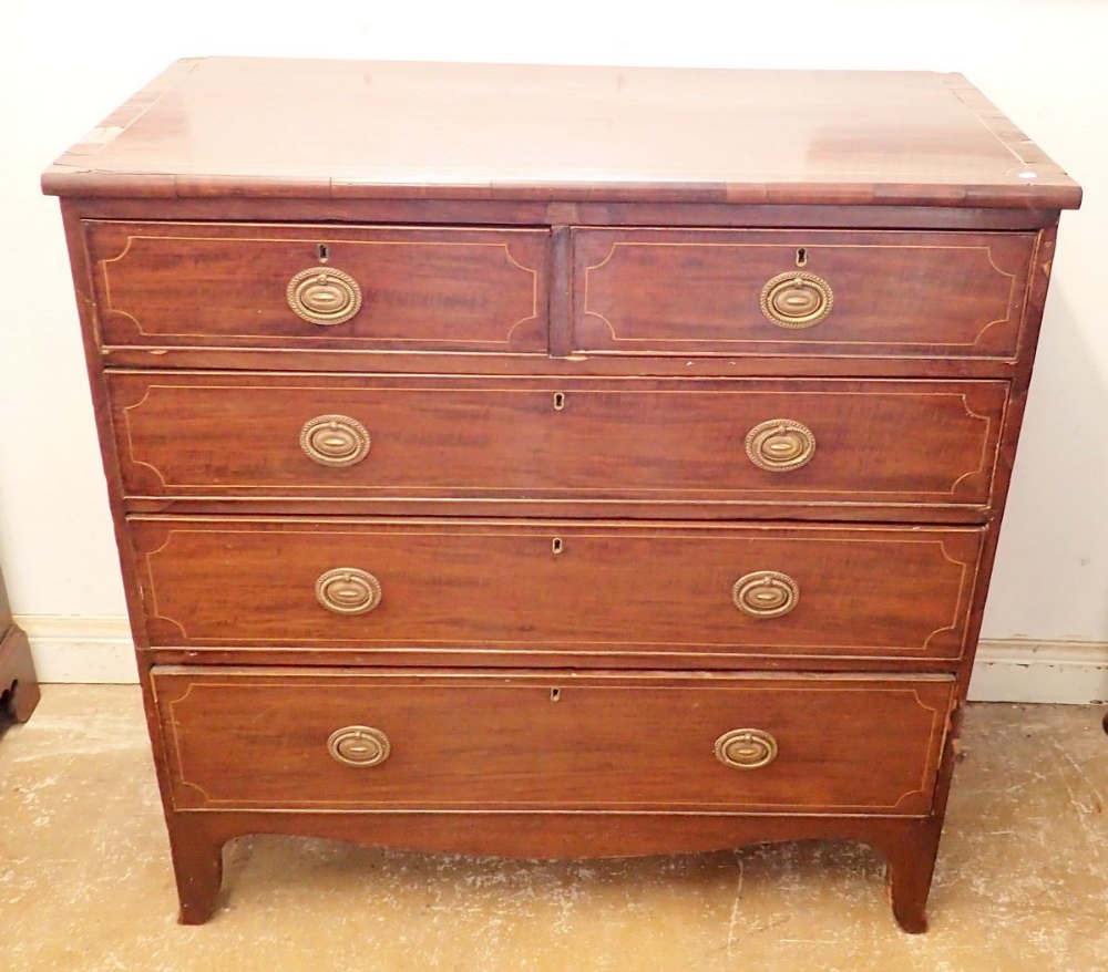 An early 19th century mahogany chest of two short and three long drawers on splay supports, 104cm