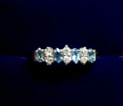 A 9 carat gold ring set aquamarines and cubic zirconium, size M -N, 1.9g