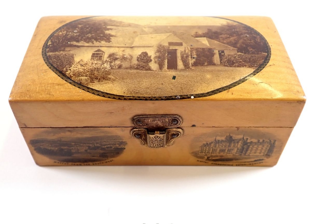 A Mauchline ware souvenir box decorated scenes of Moffat, Scotland, 11.5cm wide