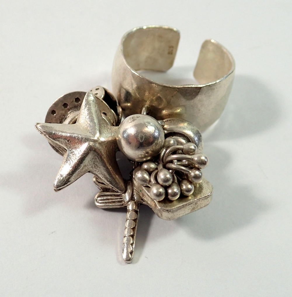 Five silver ethnic style rings and a silver kilt pin - Image 2 of 2