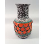 A West German Studio vase with orange, black and white mottled decoration, 25cm tall