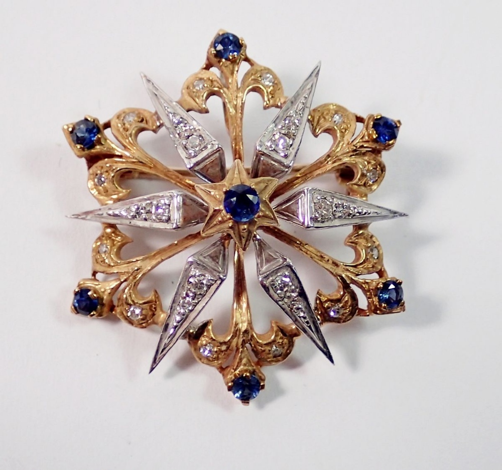 A 9ct gold star form brooch/pendant set diamonds and sapphires, 6g