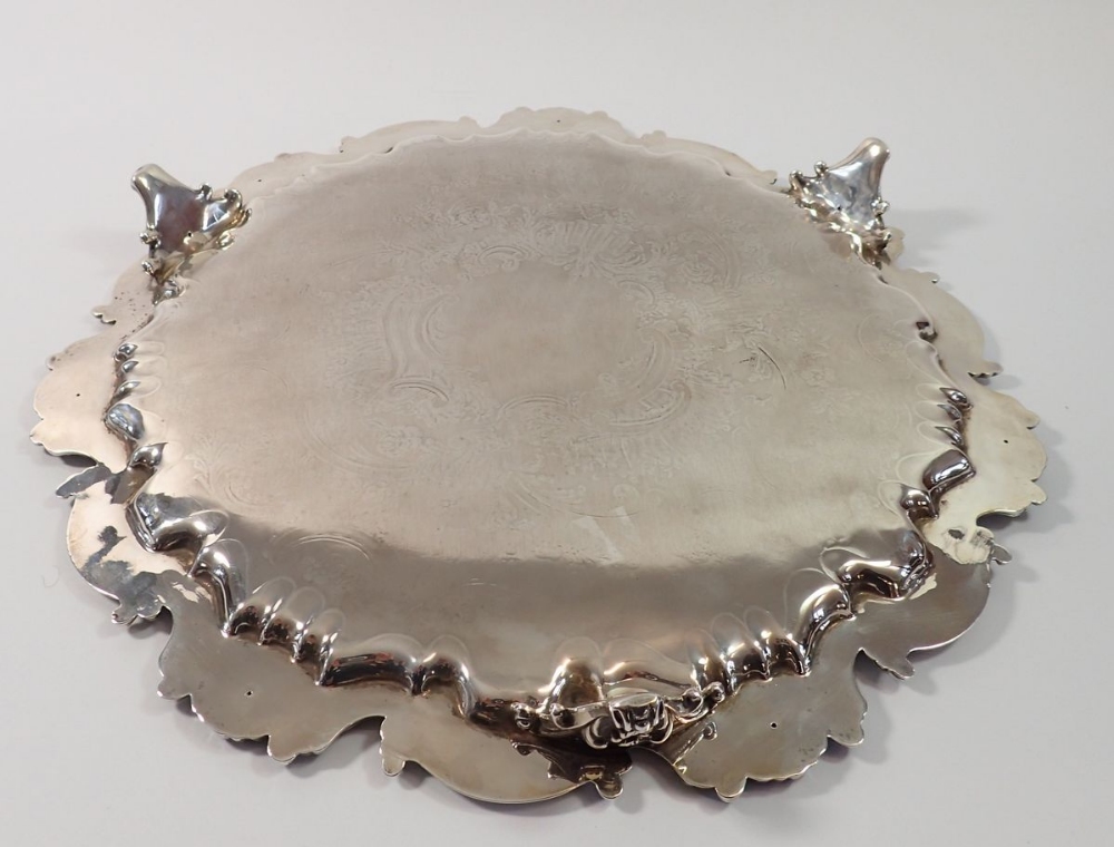 A Victorian silver pie crust edge large salver with engraved flower and scrollwork decoraton, on - Image 6 of 6