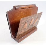 A copper and oak correspondence rack embossed horses, 25cm wide