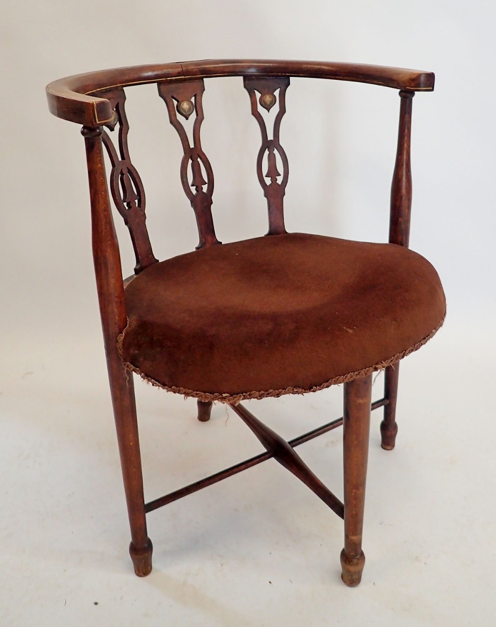 An Edwardian corner chair with painted motifs