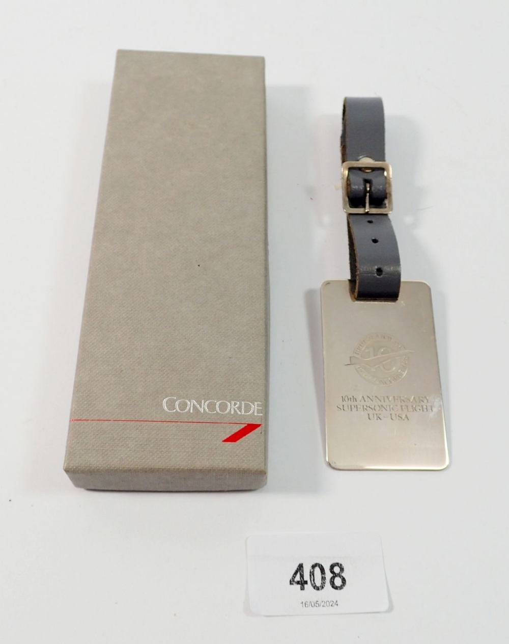 A sterling silver Concorde luggage tag, 10th Anniversary Supersonic Flight, boxed