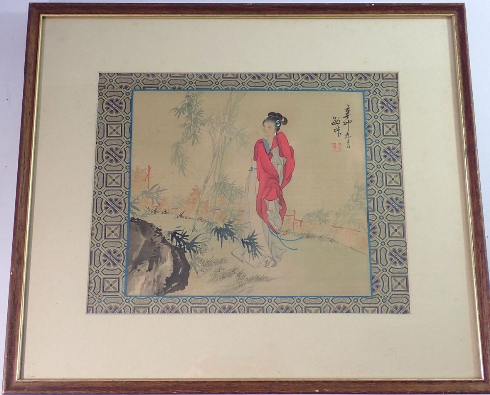 A framed Chinese silk print of lady in red, 22 x 28cm