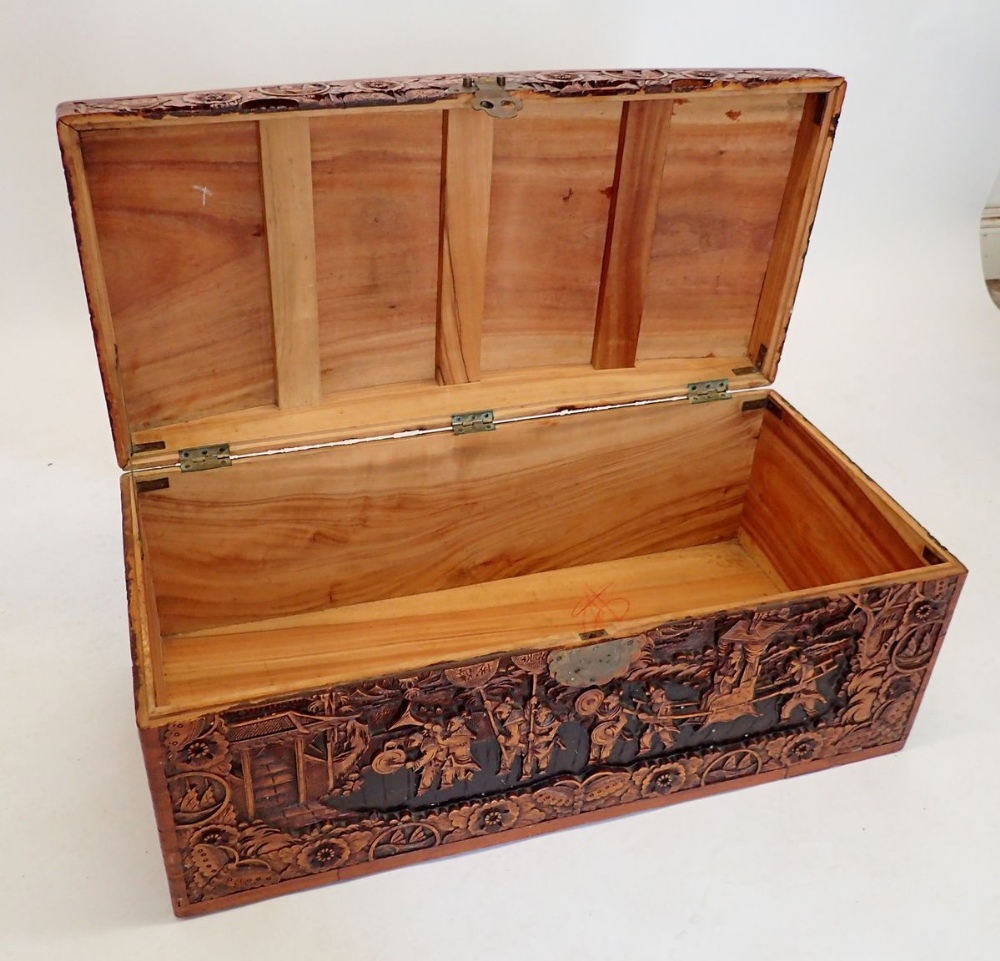 A Chinese camphorwood chest with dome top, carved oriental scenes, 90cm wide - Image 2 of 4