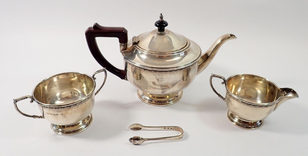 A silver tea service with leaf and berry border, Birmingham 1933 by James Walter Tiptaft and a - Image 3 of 3