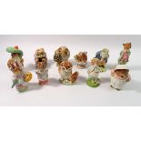 A group of eleven Beswick Beatrix Potter figures, four with gold back stamps including Tommy