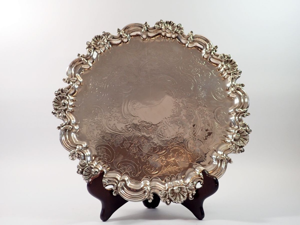 A Victorian silver pie crust edge large salver with engraved flower and scrollwork decoraton, on - Image 5 of 6