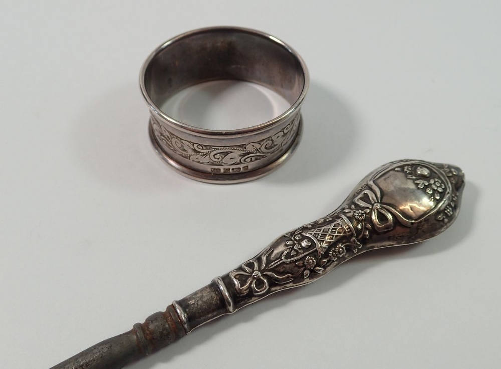 A silver button hook with floral and ribbon decoration, a silver collared cut glass atomiser and a - Image 2 of 2