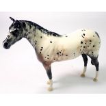 A Royal Doulton Appaloosa horse, 19.5cm tall