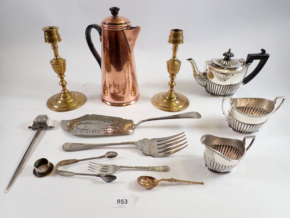 A box of metalware including copper coffee jug, brass candlesticks etc.