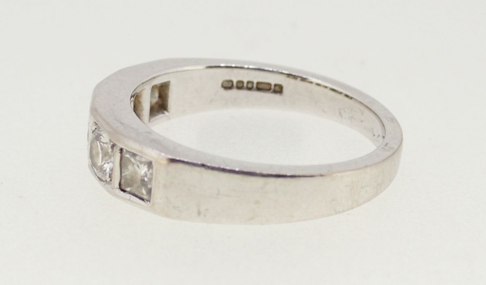A modern 18 carat white gold diamond ring set five brilliant and cushion cut stones, size M, 5.2g - Image 3 of 4