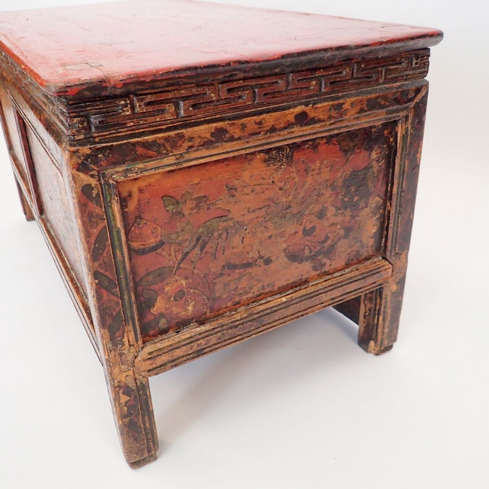 A small Chinese red painted wooden chest with floral decoration, secret door to reverse, 75 x 38 x - Image 4 of 4