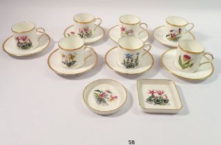 A Royal Worcester coffee set printed flowers comprising seven cups and saucers plus two pin dishes
