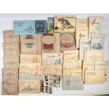 A box of cigarette cards all in albums including military uniforms of the British Empire overseas,