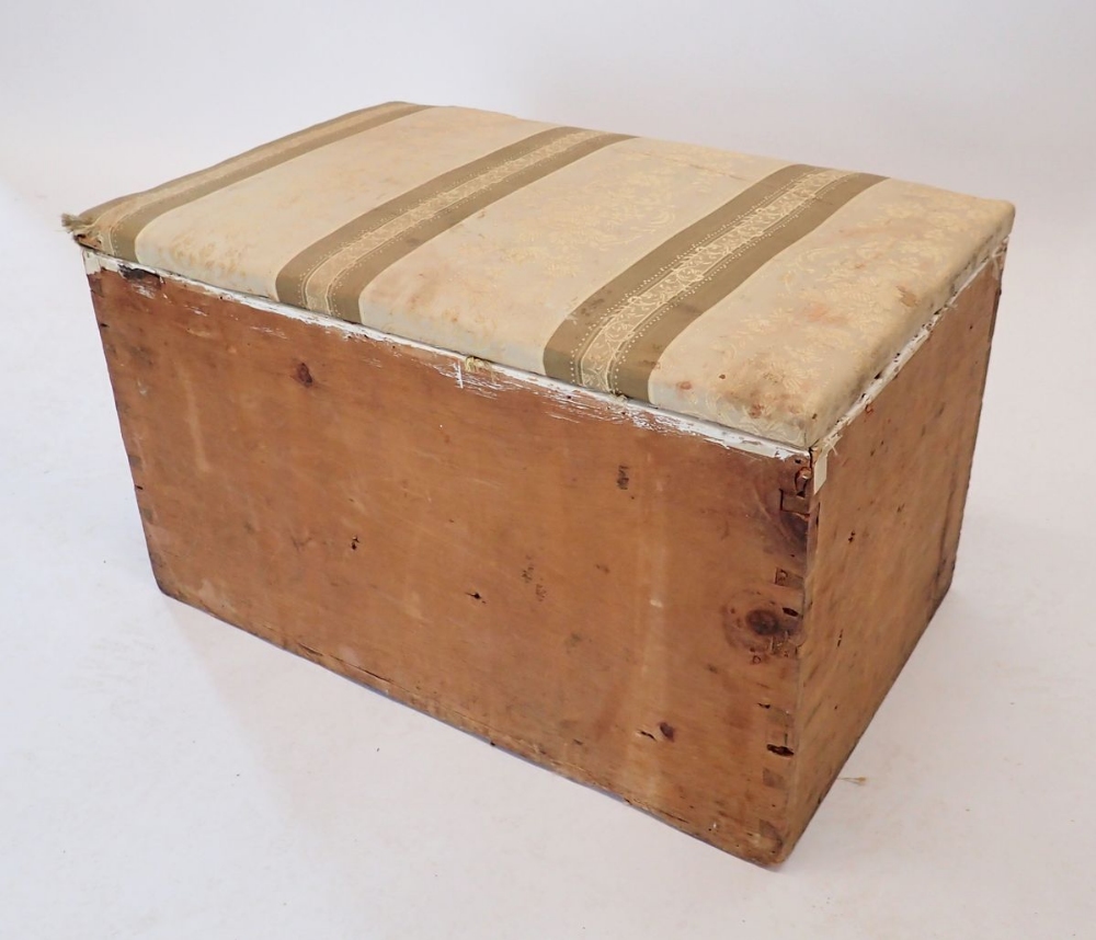 An old pine box with upholstered top, 56 x 35 x 33cm