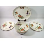 A Royal Worcester Evesham serving bowl, two cake plates and a meat plate, 38cm
