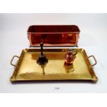 A copper plant trough 38cm long, a brass hammered tray, a miniature gurnsey and a brass bell