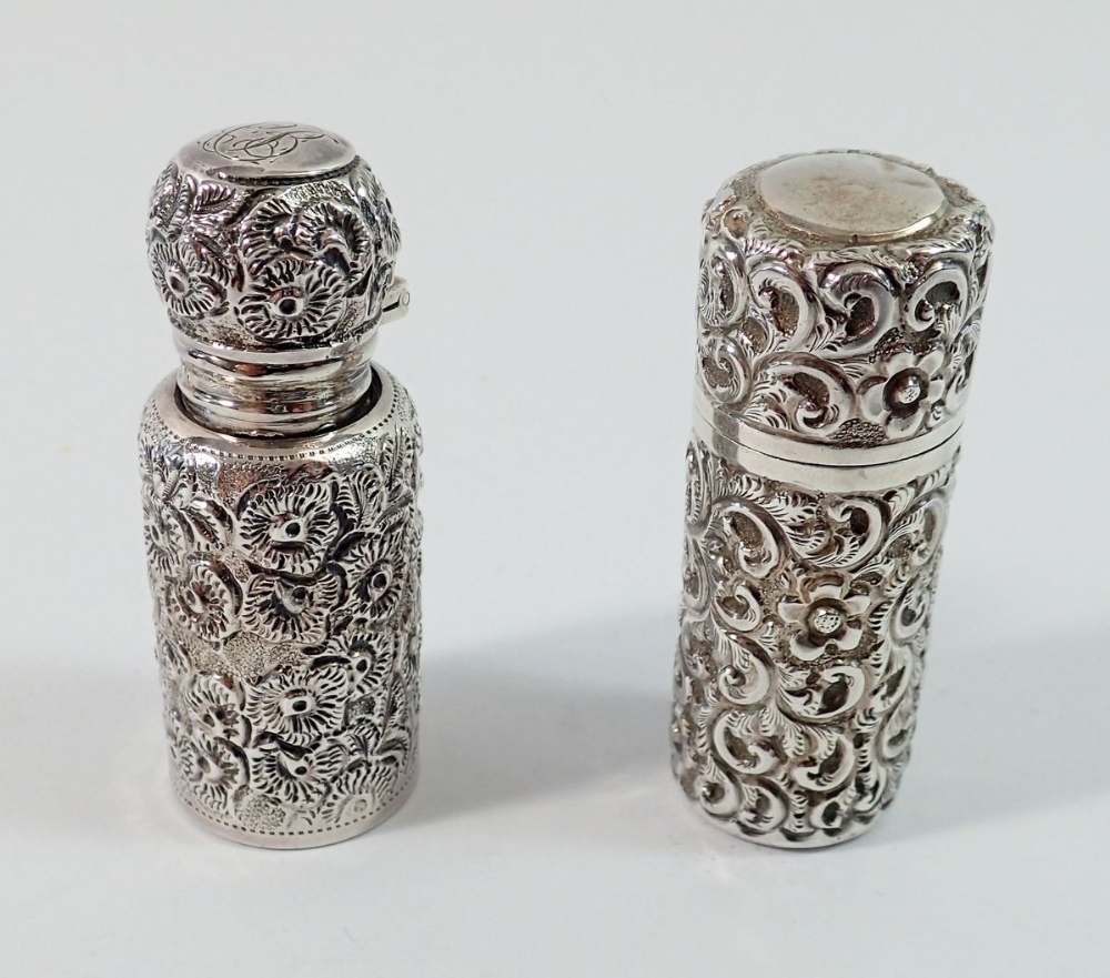 Two silver perfume/smelling salt bottles, Chester 1903 and Birmingham 1900, 5.5cm tall