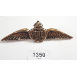 A brass RAF badge, 12.5cm