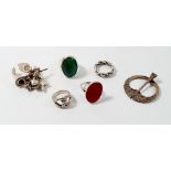 Five silver ethnic style rings and a silver kilt pin