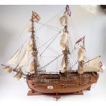 A wooden model three masted sailing ship, 78cm tall