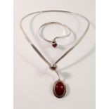 A matching silver and agate necklace and bracelet