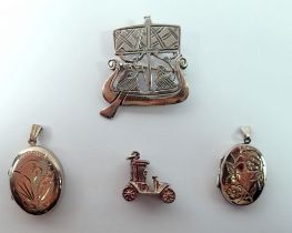 Two silver lockets, a silver car charm and a sterling silver boat form brooch