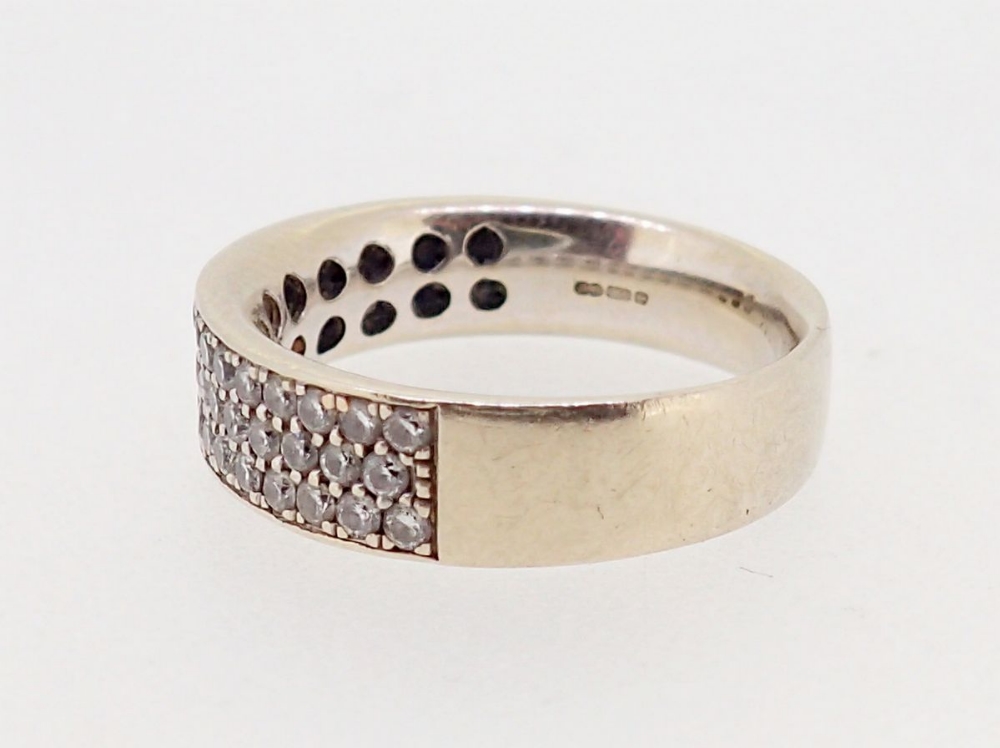 An 18 carat gold modern wide band ring set three rows of small diamonds, size H-I, 4.5g - Image 3 of 4