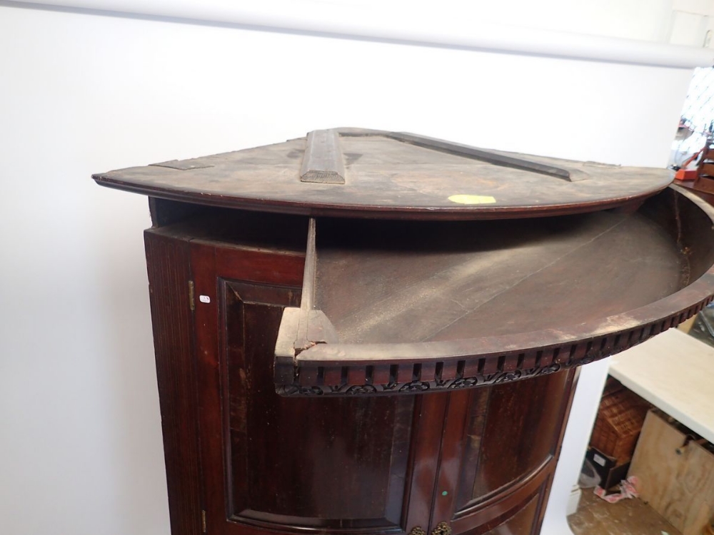 A 19th century bow fronted mahogany corner cabinet with unusual hinged secret compartment to - Image 3 of 3