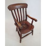A Victorian Childs potty chair with slat back